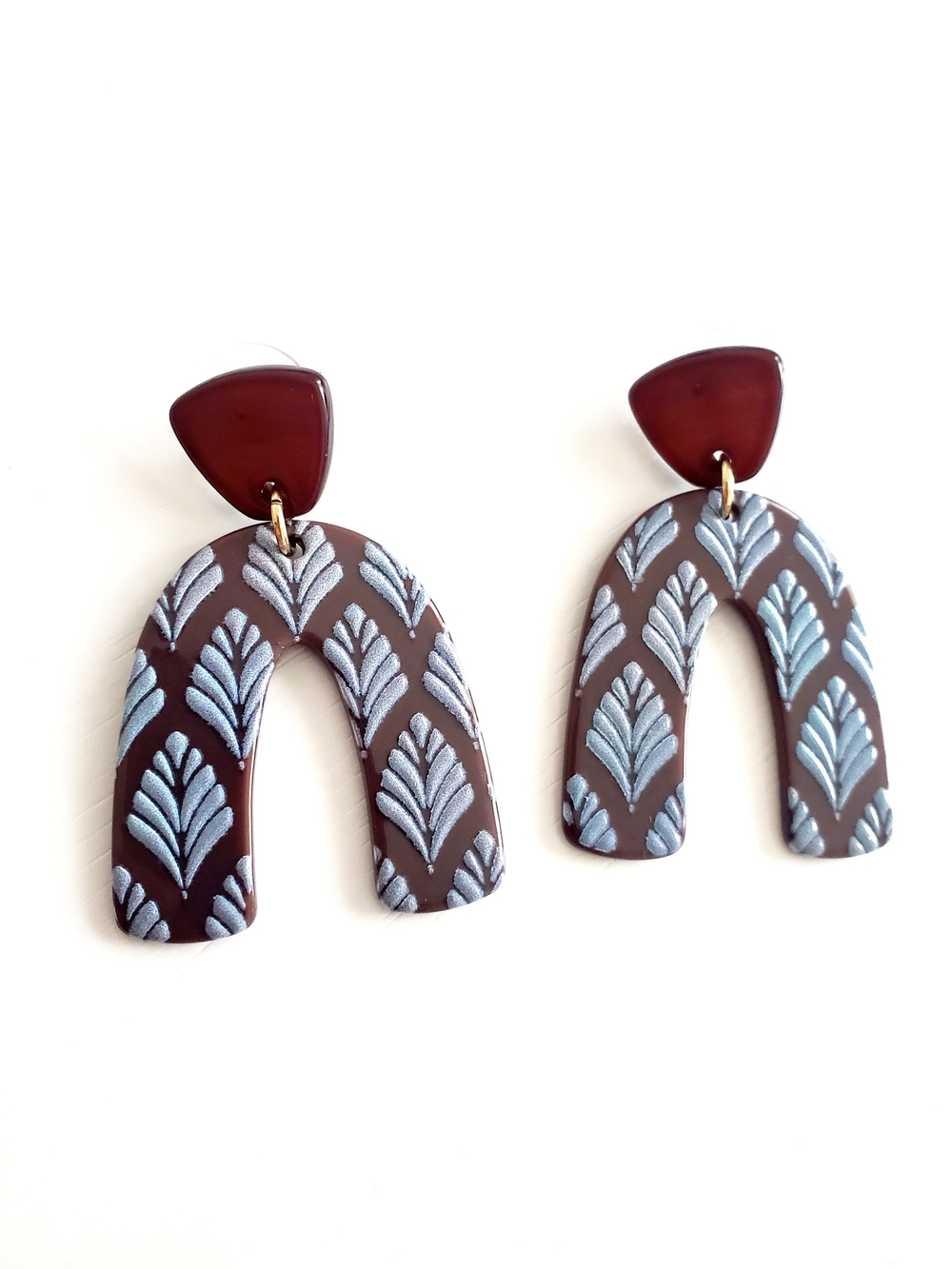 Brown Arch Drop Earrings with Pale Blue Leaf Pattern